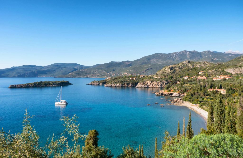Sail boat in a cove of Mani.