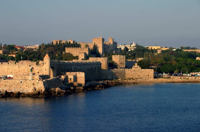 The city walls and the Palace of the Grand Master in the dawn light, Rhodes.